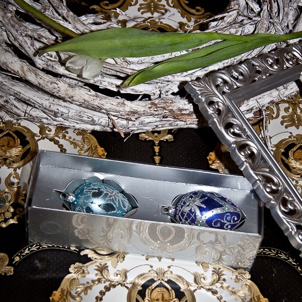 Silver box with two glass Easter eggs