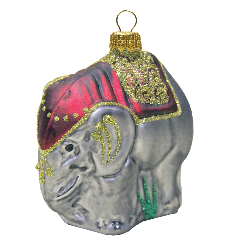 Glass elephant with gold saddle
