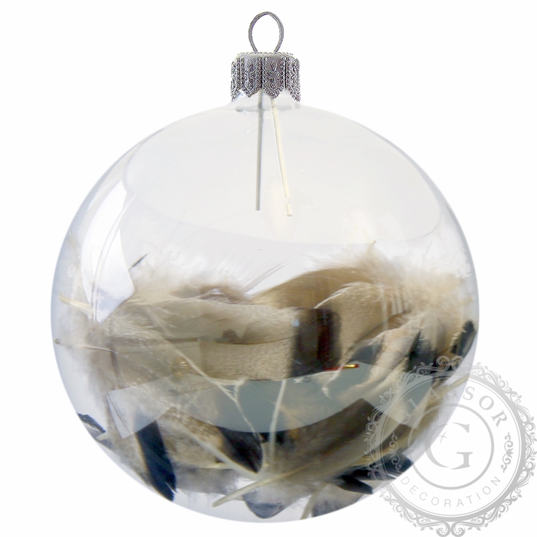 Glass bauble filled with brown bird feathers