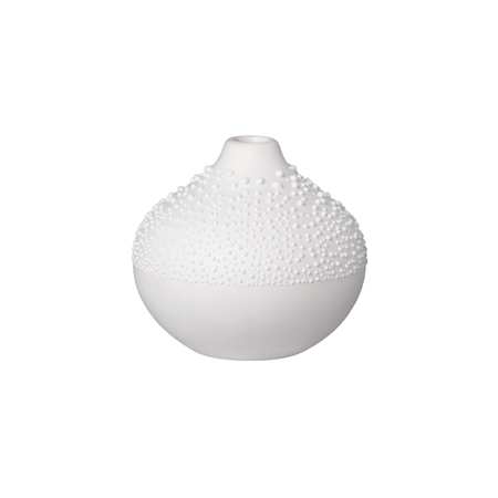 White porcelain vase with droplets