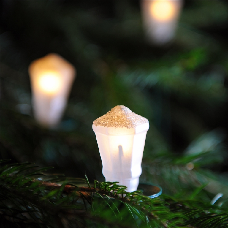 Christmas lights with glass white lanterns