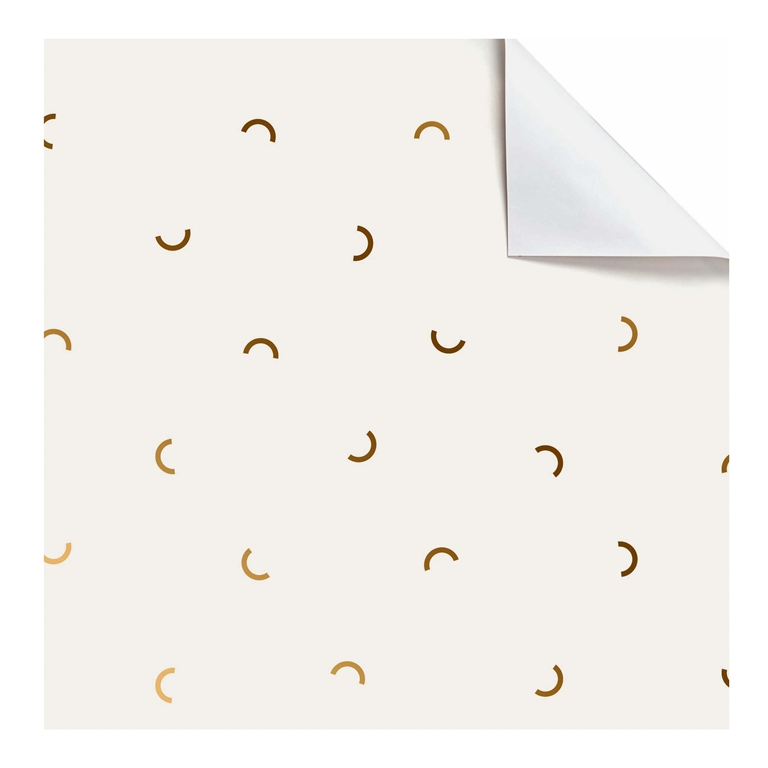 White gift paper with golden crescents
