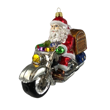 Santa on a chopper motorbike with a chest Christmas ornament
