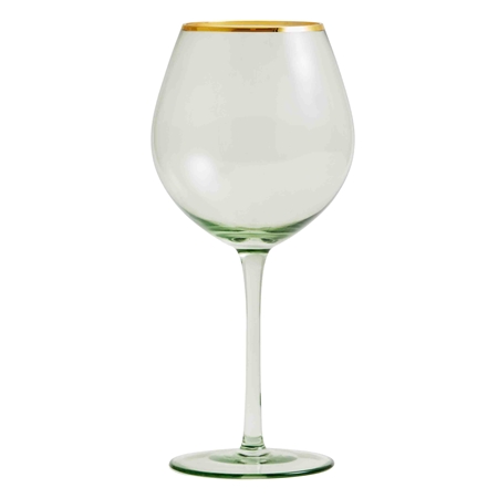 Green wine glass with a golden edge