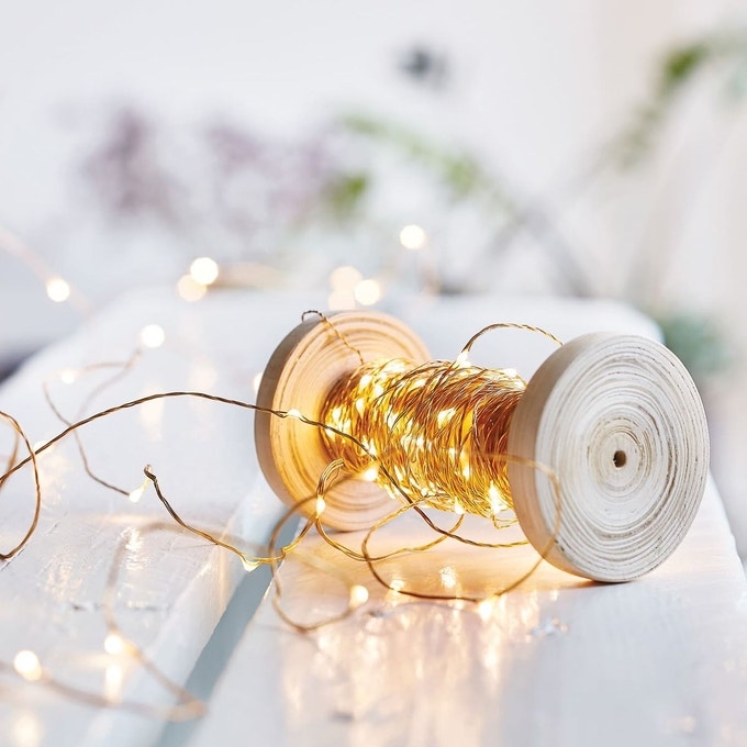 Fairy lights on wooden spool