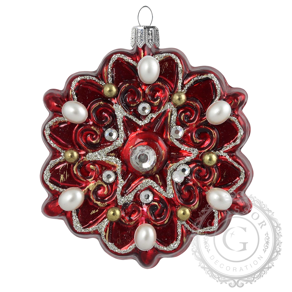 Red snowflake ornament with golden decoration