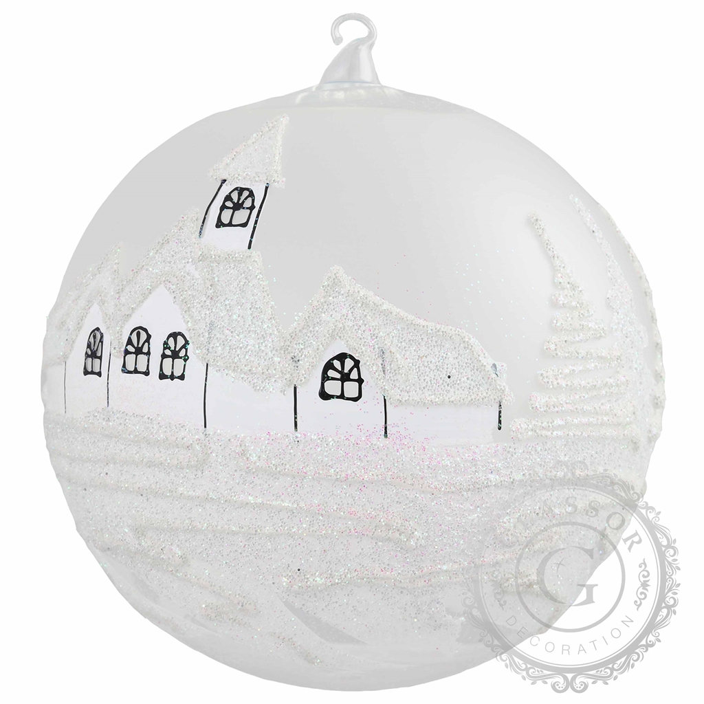 Glass bauble with white village motif
