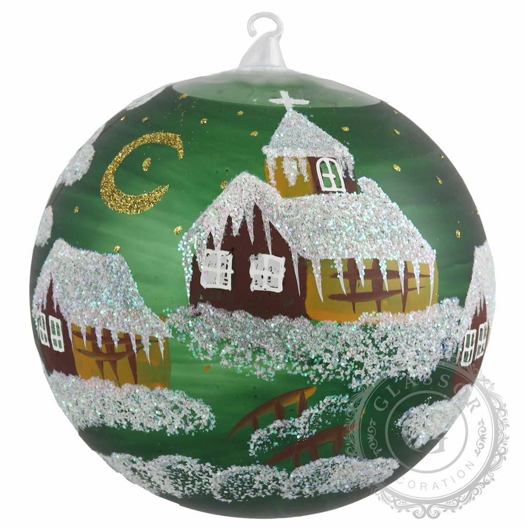 Glass candleholder with a painted dark green village