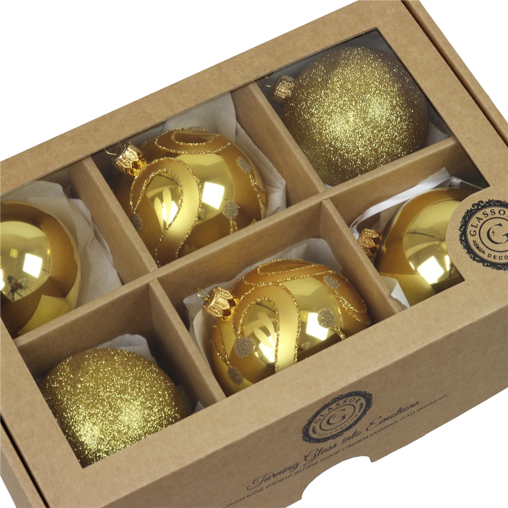 Set of gold Christmas balls with glitter
