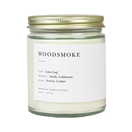 Scented candle in a glass jar Woodsmoke