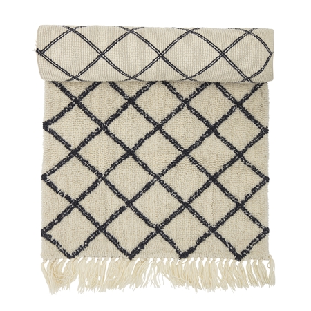 Woolen carpet with a geometric pattern