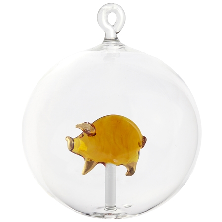 Clear ball with a piglet figurine