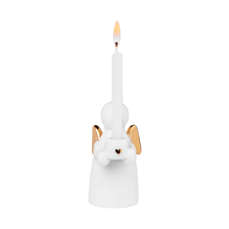 Porcelain guardian angel with a candle