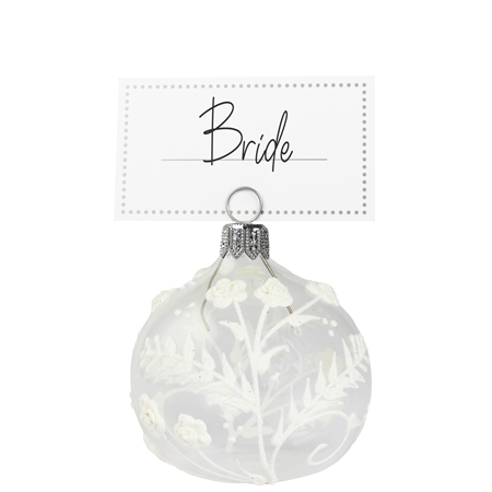 Transparent table seating plan holder bauble with white flower with a stem decor