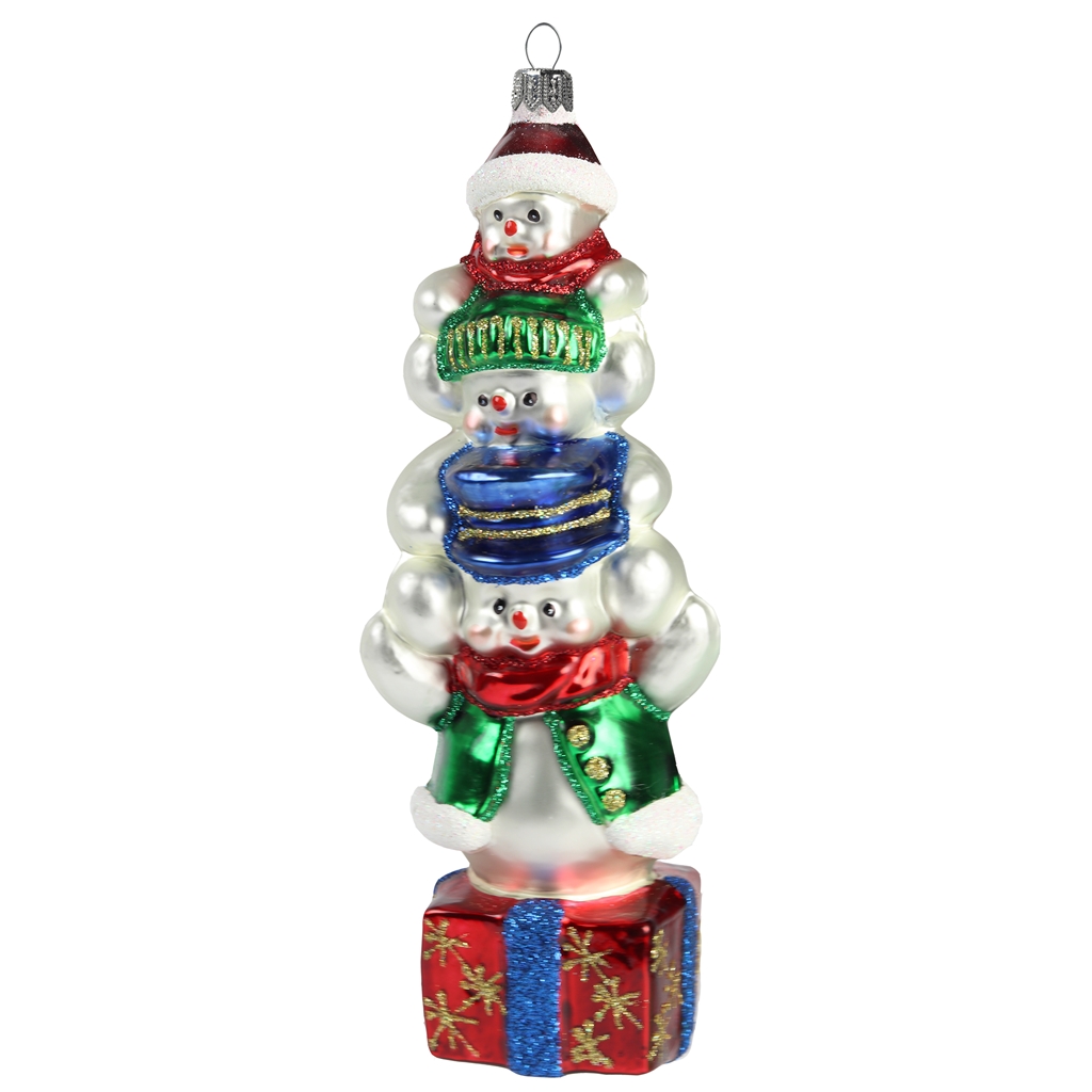 Christmas decoration – three snowmen on a gift