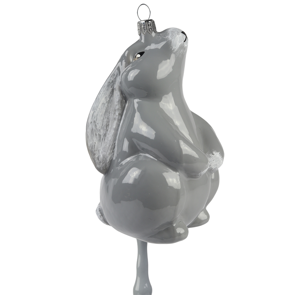 Gray hare with spring décor on a stick