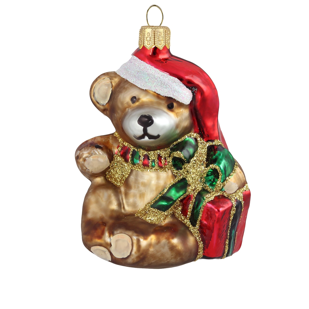 Christmas teddy bear with a gift