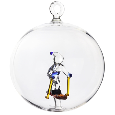 Transparent bauble with a skier