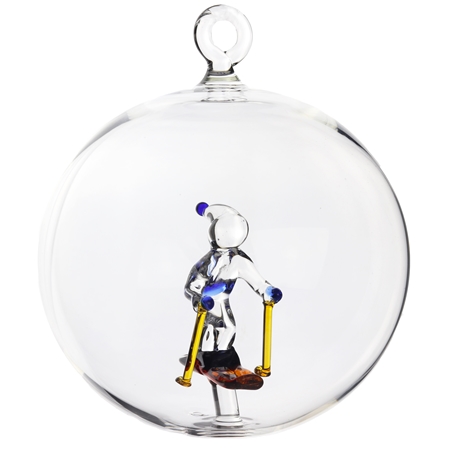 Transparent bauble with a skier