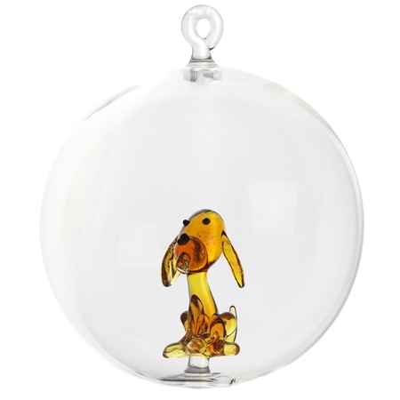 Transparent ball with sitting dog figure