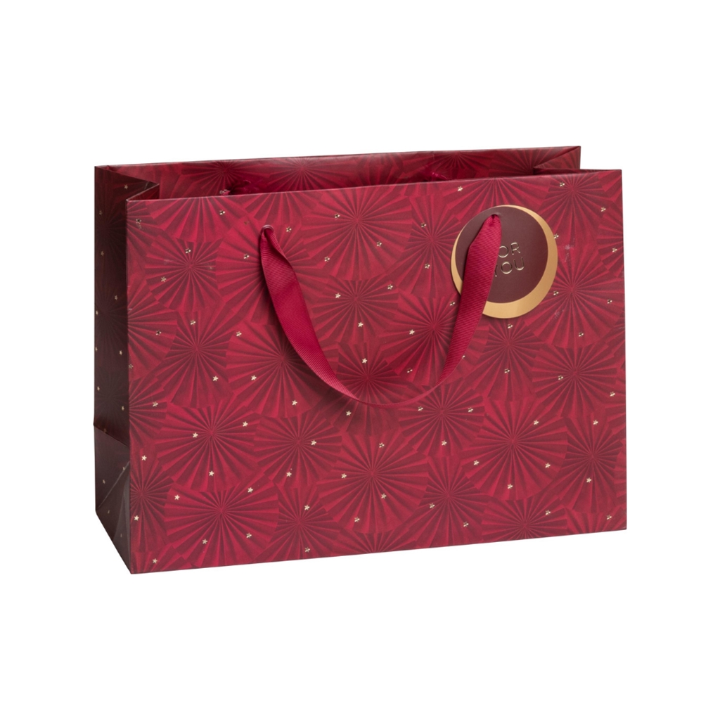 Burgundy color gift bag with stars