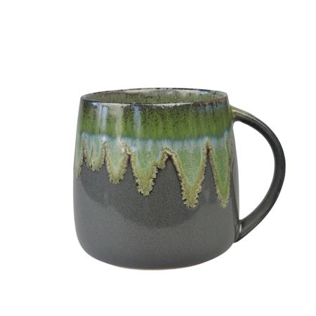 Black mug with running glaze