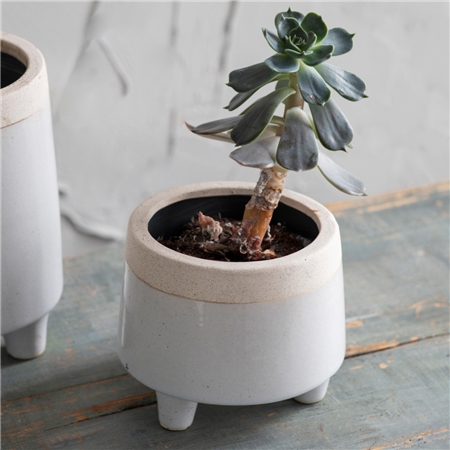 Small ceramic pot with legs