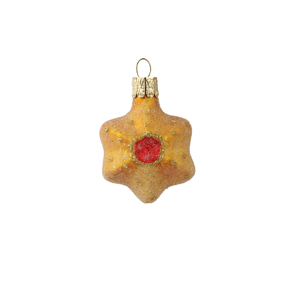 Golden star ornament with red glitter