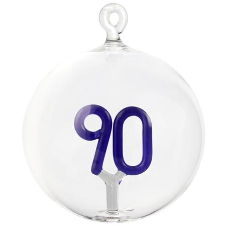 Dark blue glass ornament with number 90 inside