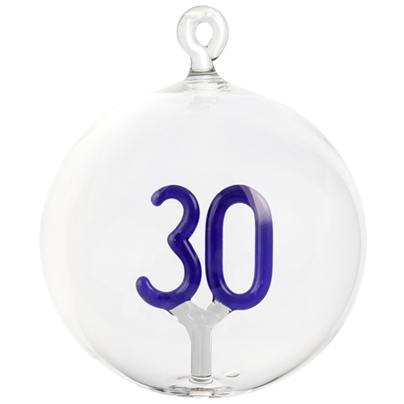 Dark blue glass ornament with number 30 inside