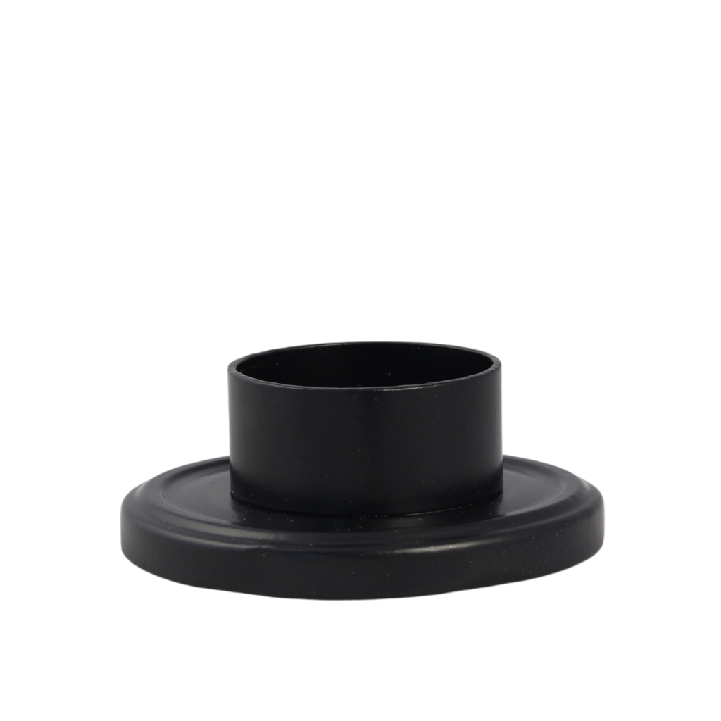 Black wide candle holder on a jar lid