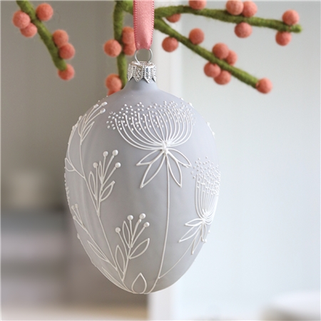 Grey Easter egg with floral decoration