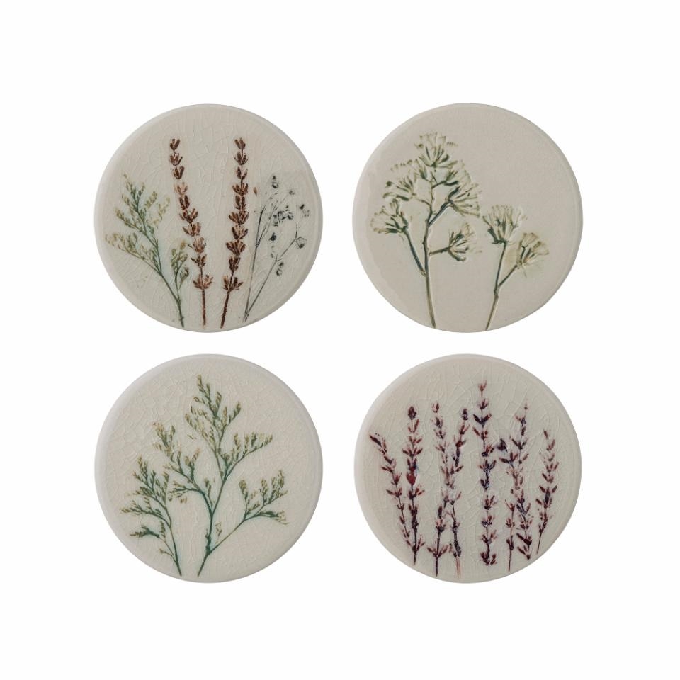 Set of glazed coasters with a decor