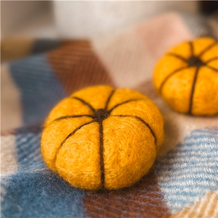 Yellow felt pumpkin from sheltered workshop