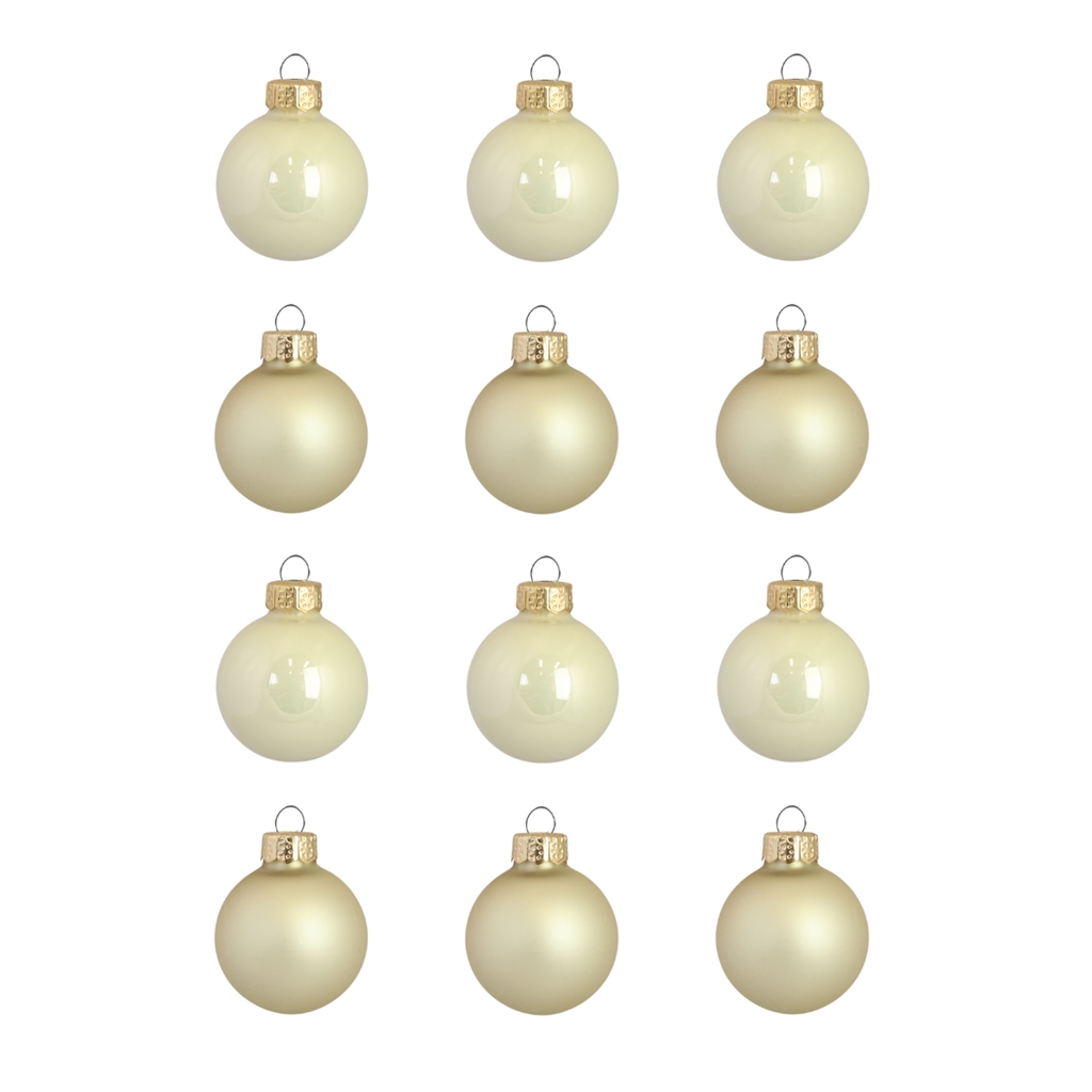Set of christmas decorations in cream and gold