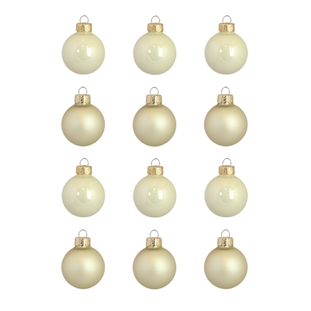 Set of christmas decorations in cream and gold