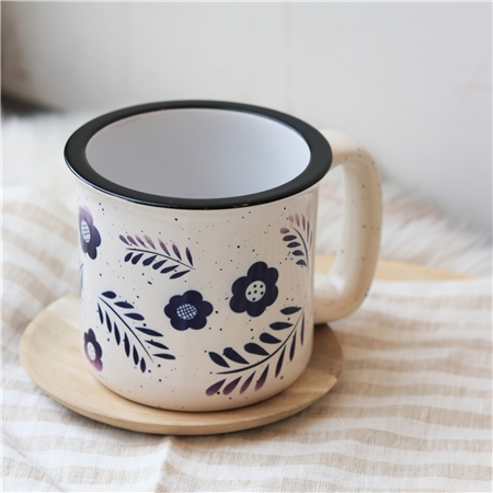 Ceramic enameled mug with blue print