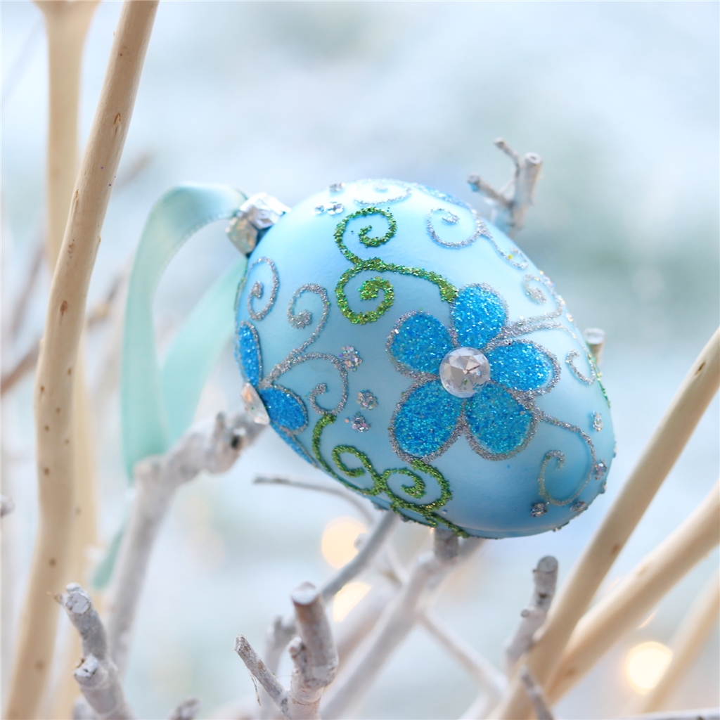 Powder blue glass Easter egg with flower décor
