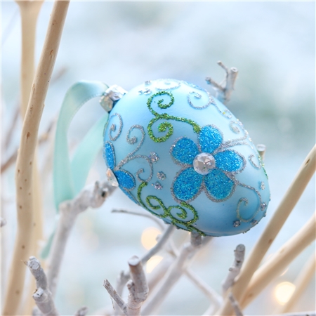 Powder blue glass Easter egg with flower décor
