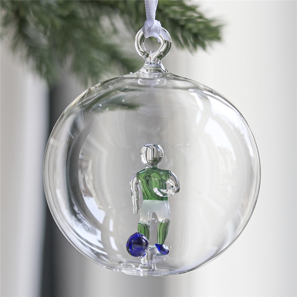Transparent bauble with a soccer player