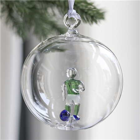 Transparent bauble with a soccer player