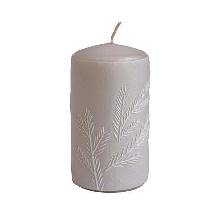 Beige candle with juniper decor