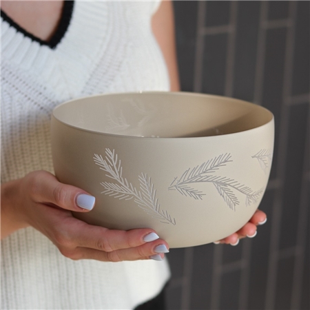 Beige glass bowl with twig decor