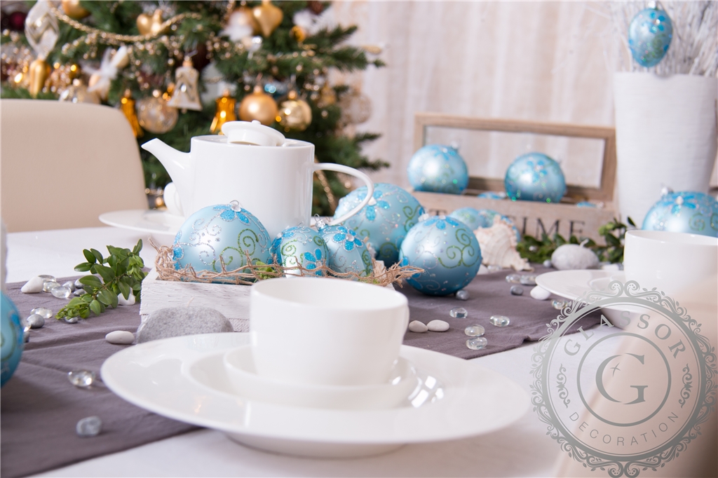 Blue Christmas ball with flower décor
