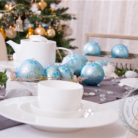 Blue Christmas ball with flower décor
