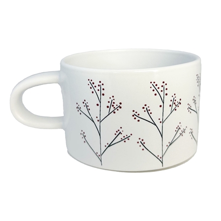 White mug with holly decoration