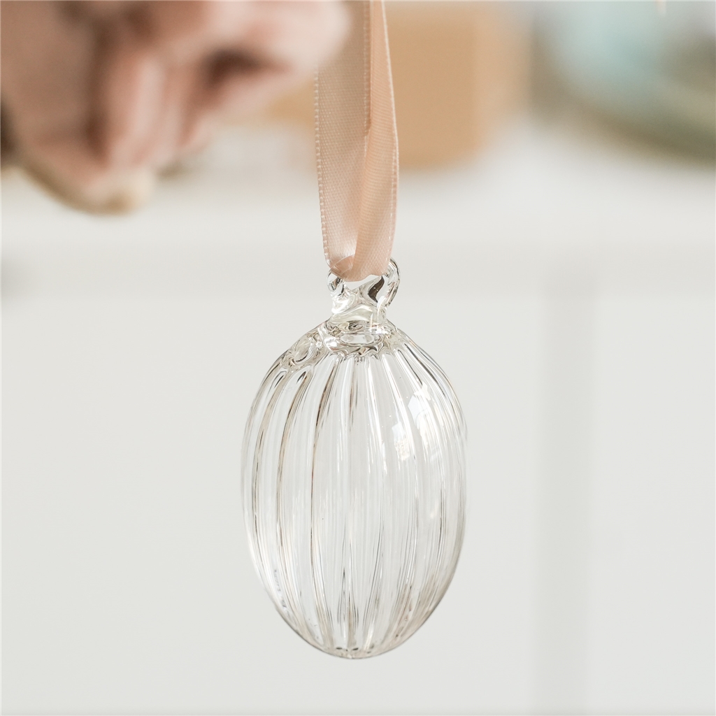 Glass easter egg with indentations