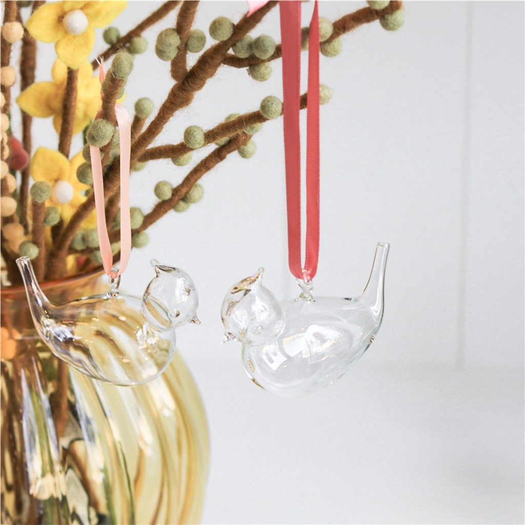 Glass bird with plume