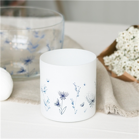 Glass candle holder with flower decoration