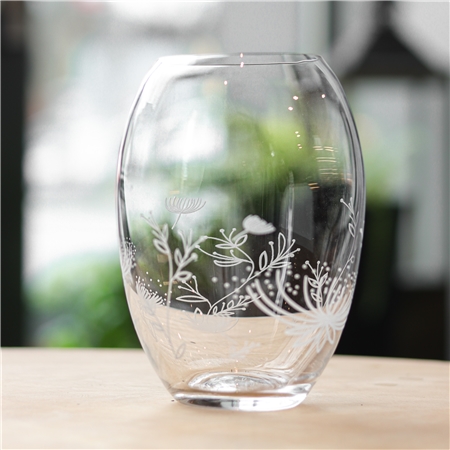 Clear round vase with flower decoration